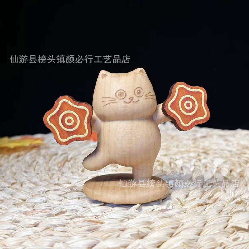 Tượng mèo nhảy múa